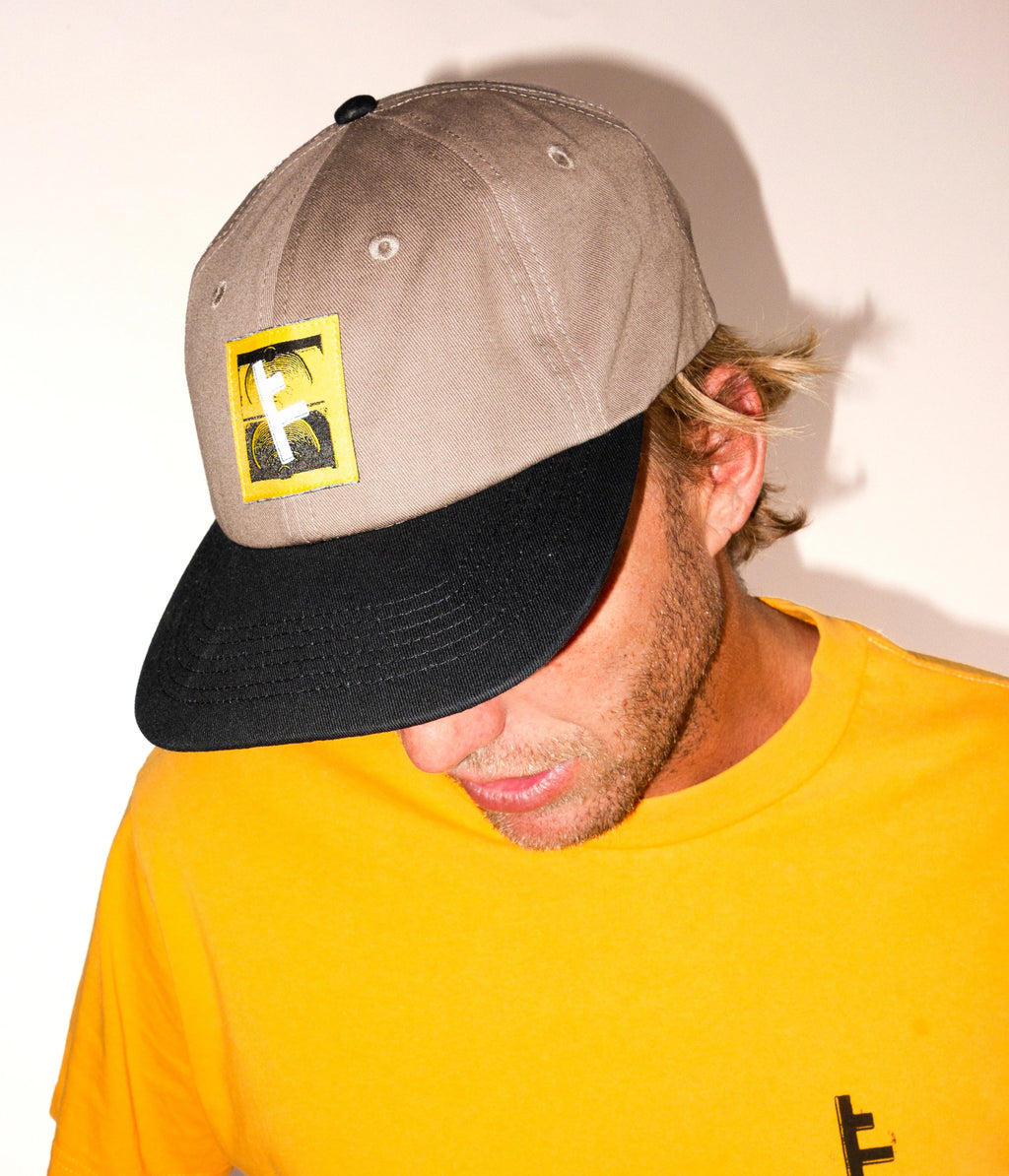 Former Slant F Cap