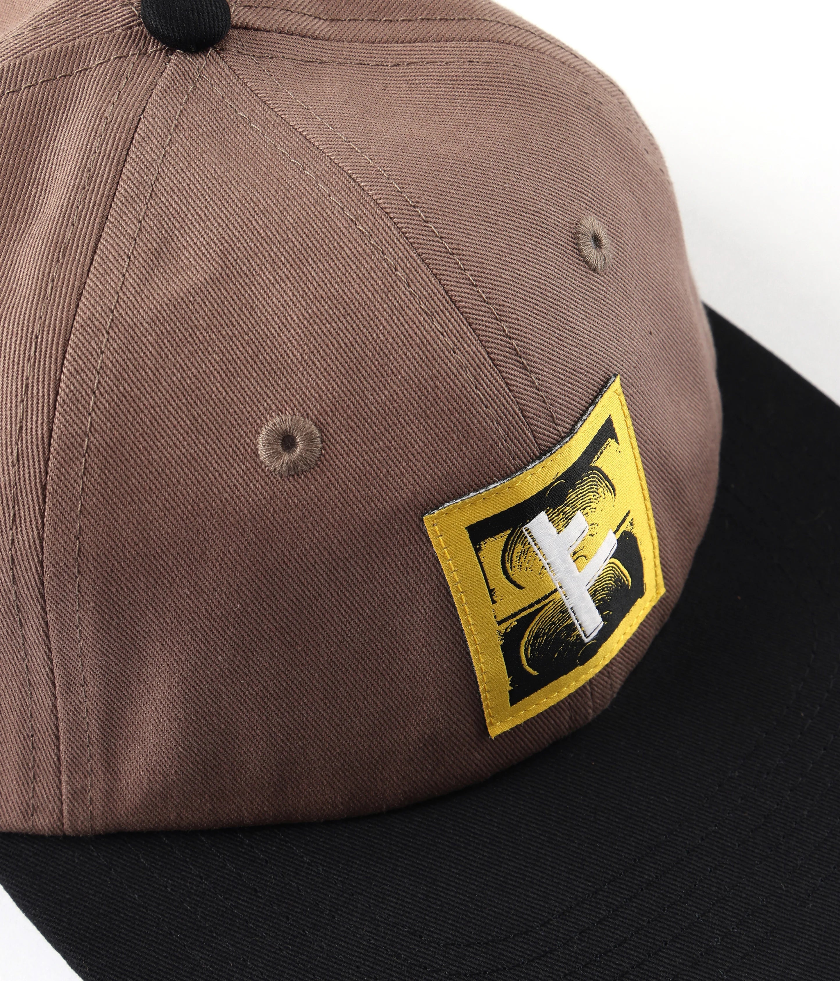 Former Slant F Cap